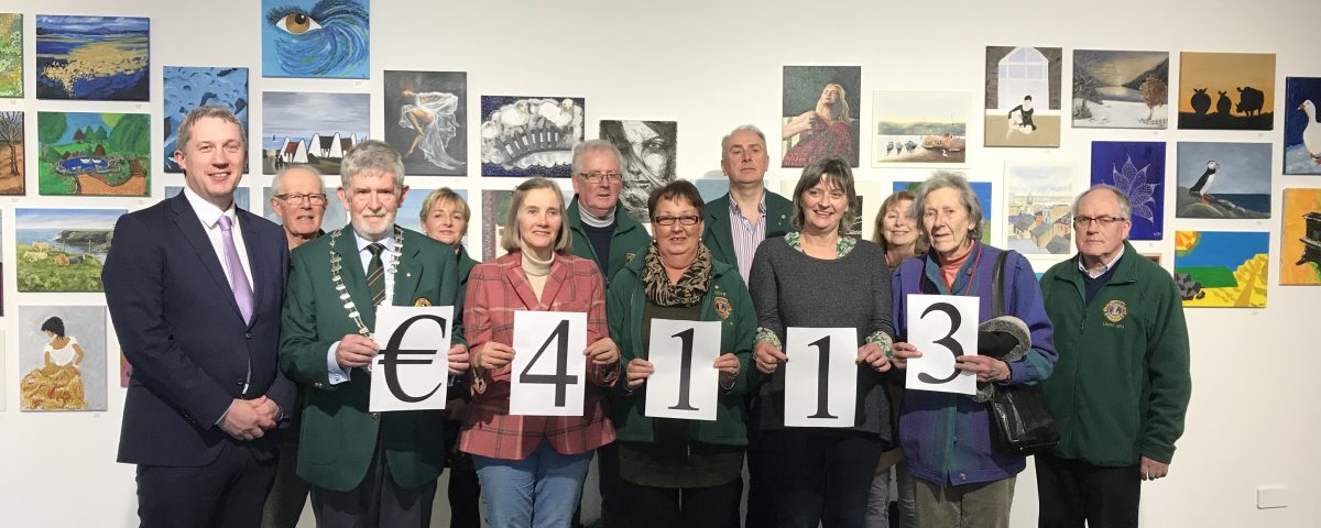 Pictured : Niall Reck, Friends of Wexford Hospital, Ger Cashman, President, Wexford Lions Club, Anna Skrine, Wexford Festival Singers, members of Wexford Lions Club & Wexford Festival Singers Photo taken at Wexford Arts Centre Annual Lions Club Art Exhibition